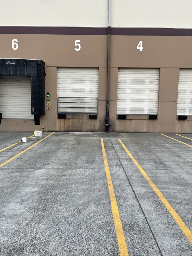 Commercial Pressure Washing Loading Dock Before Photo